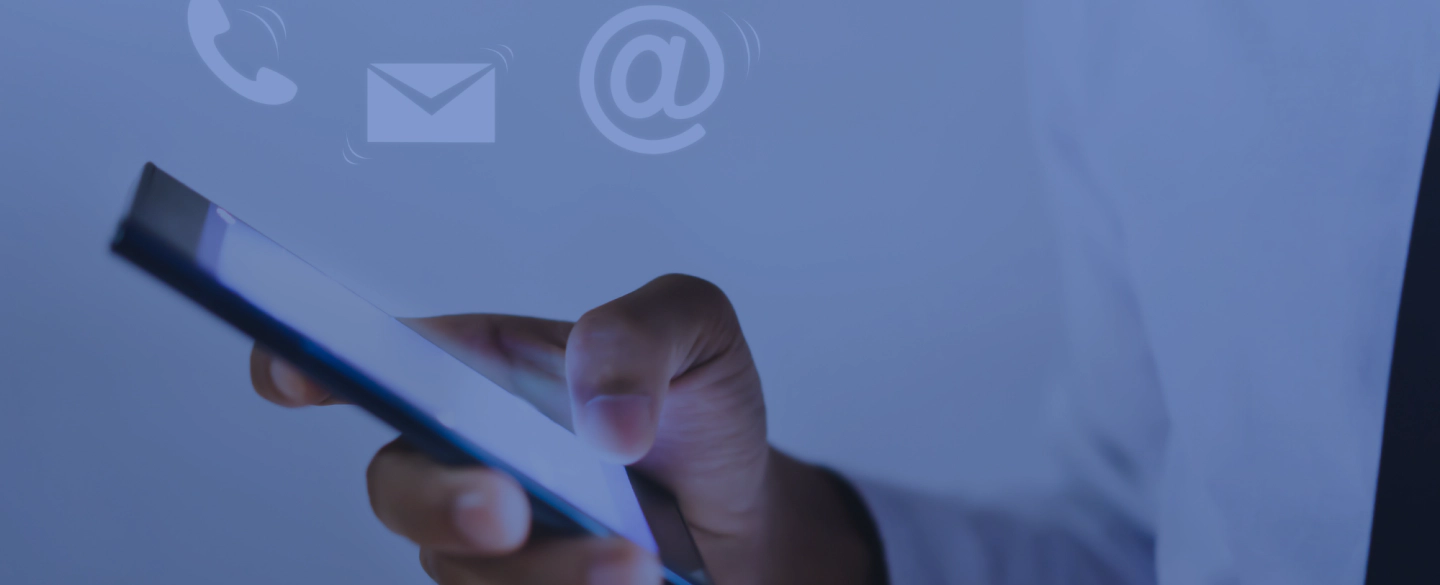 man holding a black phone with the right hand